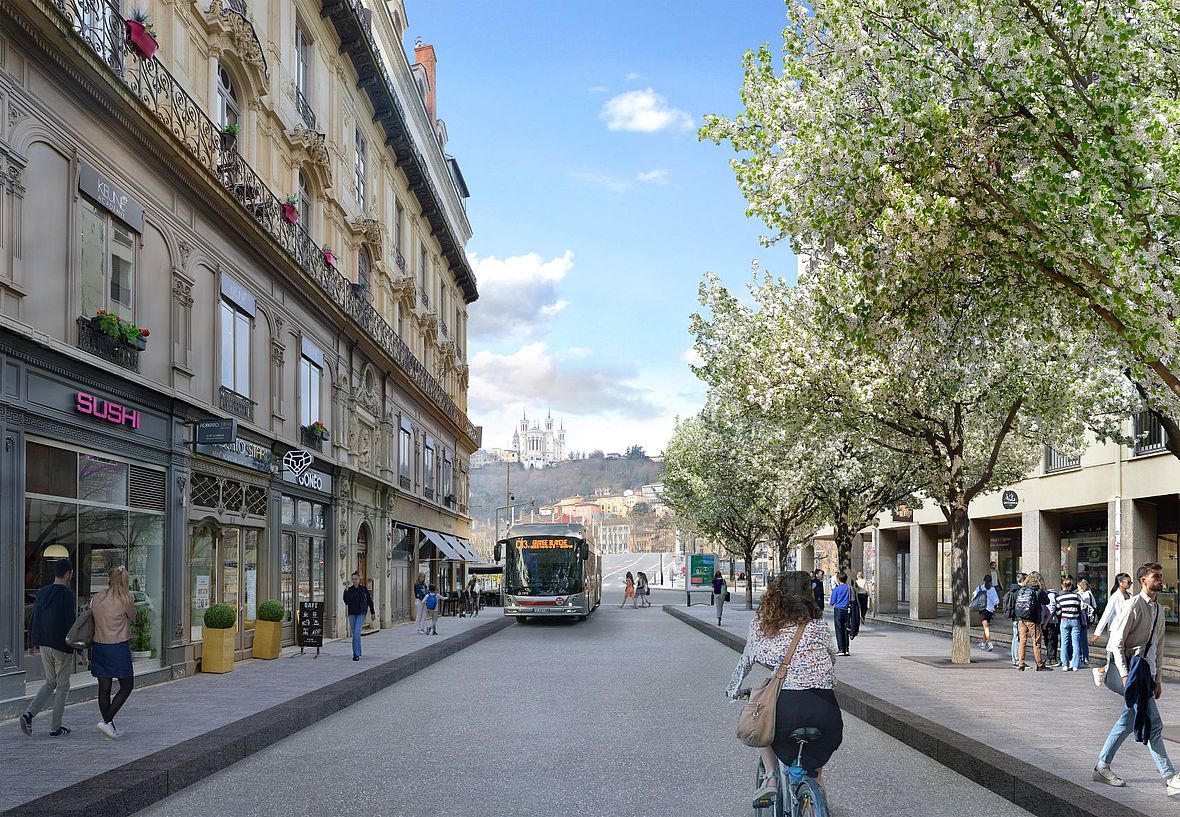 Perspective de la rue Grenette avec un partage de la rue entre les différents modes de transports